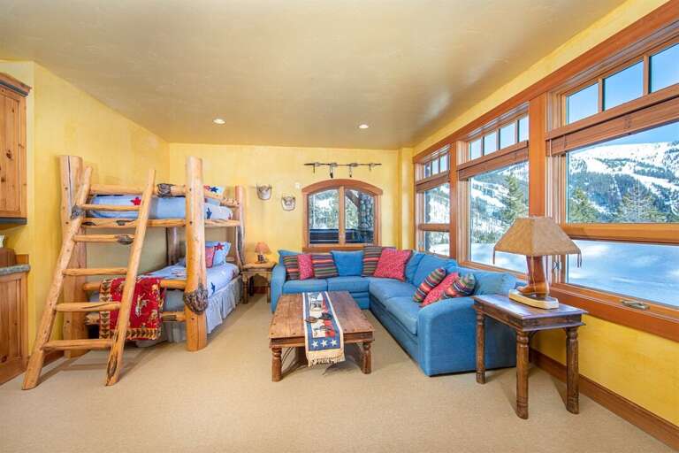 The media room offers cozy seating, television & gaming system, and twin bunk beds | Lower Level The media room offers cozy seating, television & gaming system, and twin bunk beds | Lower Level