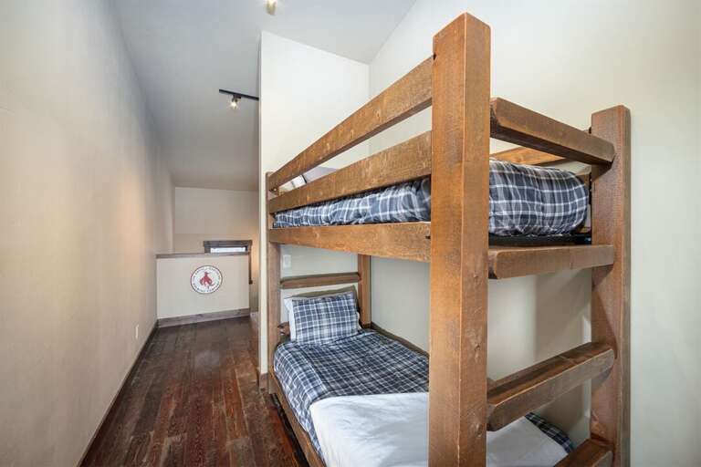 Floor 3 offers twin over twin bunk beds in the common area - a fun space for our younger guests | Upper Level