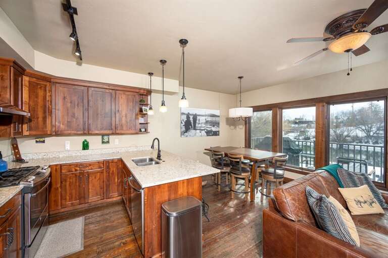 The modern kitchen is equipped with everything needed to prepare meals | Main Level