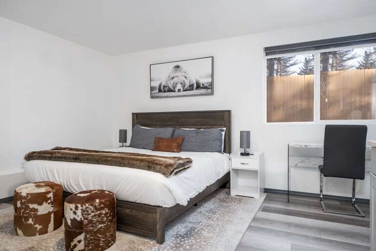 Left-side Bedroom | King-sized Bed | Desk Space | Main Level