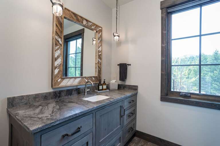 Get ready for the day in this luxurious bathroom | Main Level