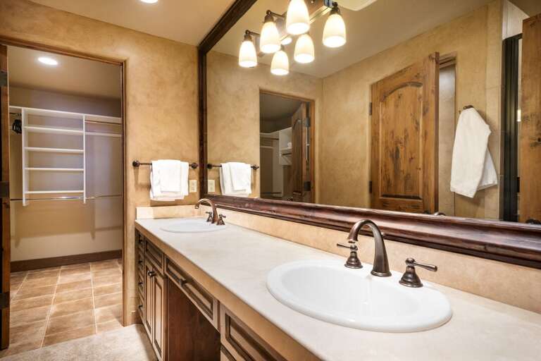 Double vanity off the walk-in closet. Double vanity off the walk-in closet.