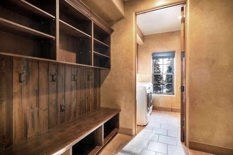 Space for snow boots and backpacks right off the laundry. Space for snow boots and backpacks right off the laundry.