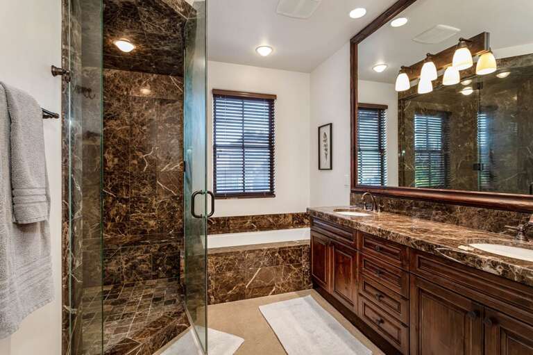 Take a luxurious bath or shower | Upper Level