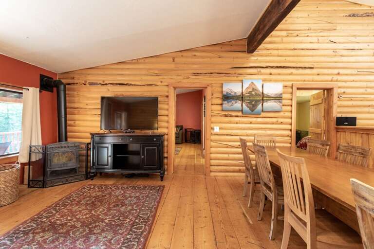 Cozy up by the wood stove | Main Level - The Great House Cozy up by the wood stove | Main Level - The Great House