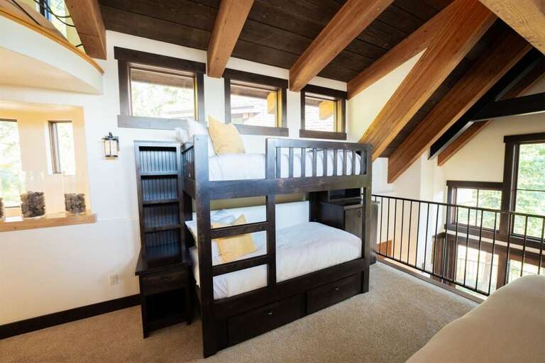 A delight to our younger guests, the second bedroom offers custom built twin bunk beds | Upper Level