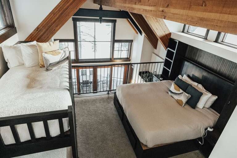 Natural light brightens the space, with windows throughout the home providing incredible vistas | Upper Level