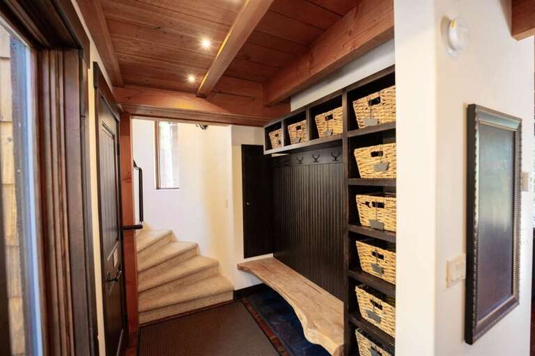 Thoughtfully designed, form meets function in the home's entryway | Main Level