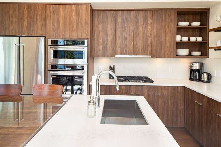 The modern kitchen features high end appliances and is fully equipped for preparing memorable meals | Main Floor