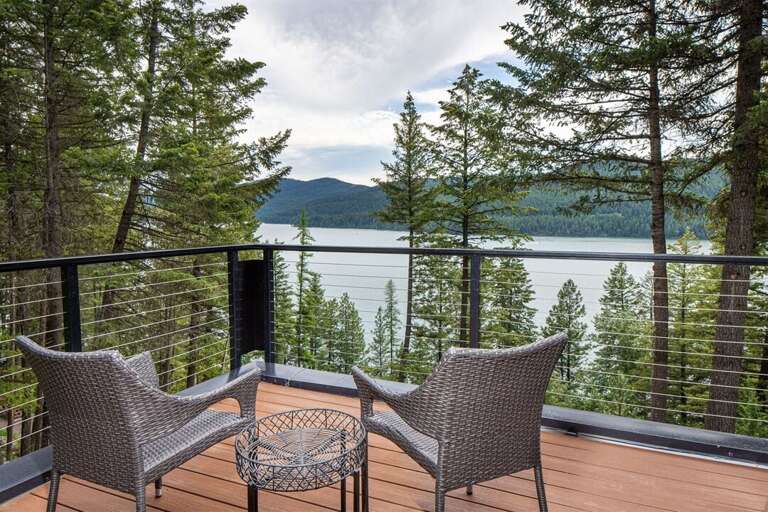 Relax and take in the lake views from the private master suite patio | Exterior