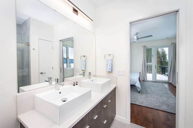 The spacious master ensuite offers walk-in shower & double vanity | Upper Level