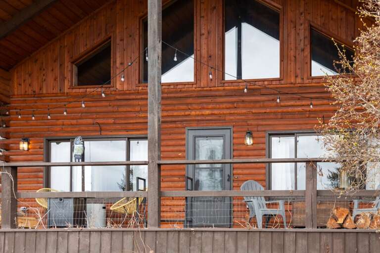 Exterior view of deck and rustic lighting | Exterior