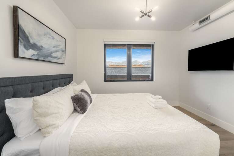 Primary King Bedroom with En Suite Bathroom | Main Level Primary King Bedroom with En Suite Bathroom | Main Level