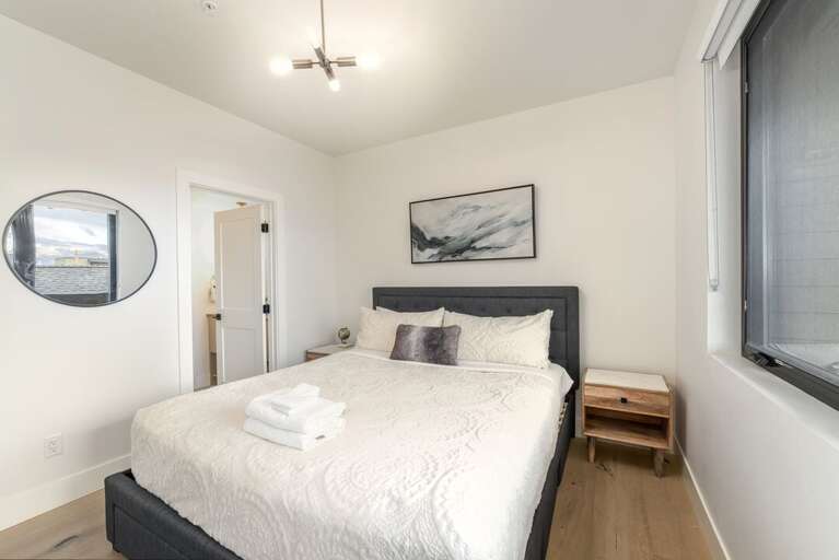 Primary King Bedroom with En Suite Bathroom | Main Level Primary King Bedroom with En Suite Bathroom | Main Level