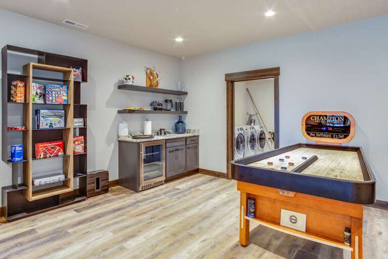 Enjoy a competitive game of Bank Shot Shuffleboard | Lower Level