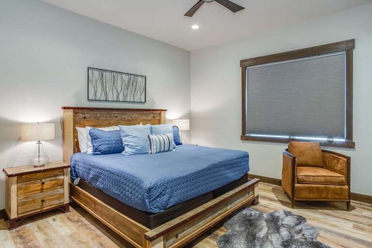 Fourth bedroom with king bed, 55" Smart TV, and full bathroom | Upper Level