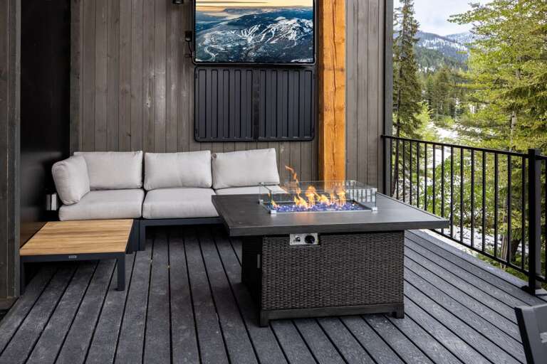 Main level deck with fire pit, lounge seating, BBQ, and 8-seat dining table with amazing views! | Exterior