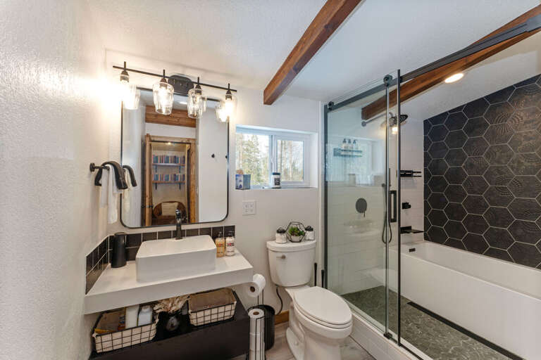 Upper Level Full Shared Bath with a Tub Inside the Shower | Upper Level