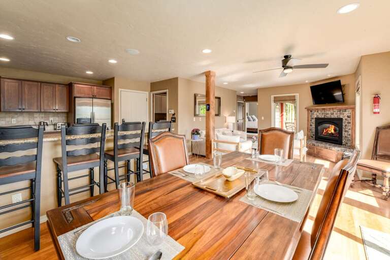 Dining Area with seating for six, hardwood floors and deck access | Main Level
