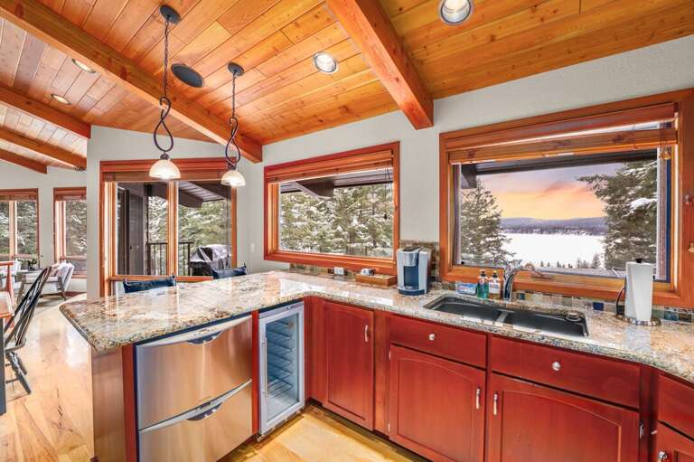 Gourmet kitchen with stainless appliances, including a gas stovetop, and hardwood flooring | Main Level