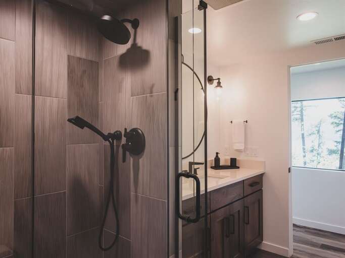 The lower level bathroom serves the two queen bedrooms | Lower Level