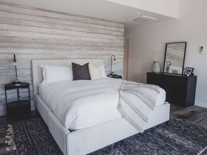 Relax and be refreshed in the luxurious master suite | Upper Level