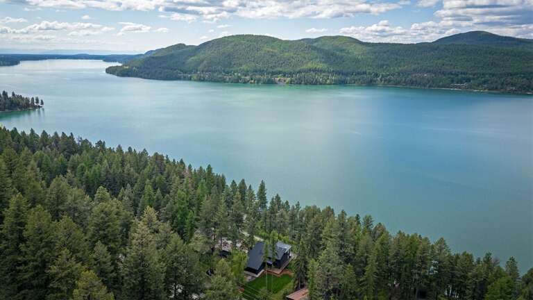 Situated just above Whitefish Lake, this home offers a beautiful Montana retreat | Exterior