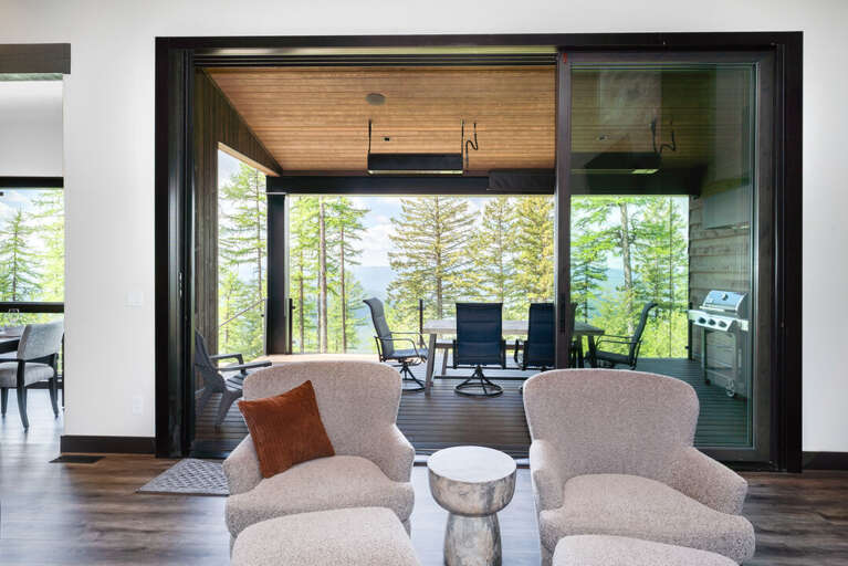 Opens to a Covered Deck with Heaters | Main Level Opens to a Covered Deck with Heaters | Main Level