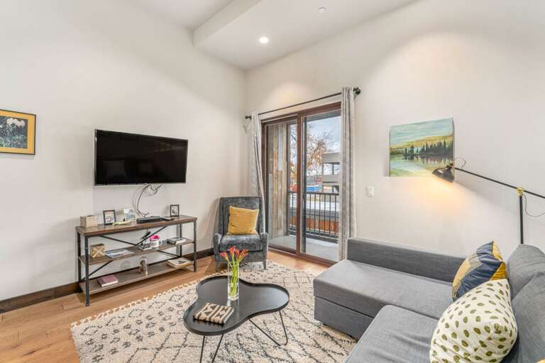 Access to private balcony from living room and smart TV | Main Level