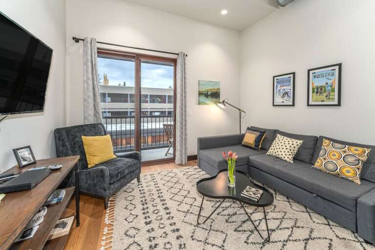 Access to private balcony from living room and smart TV | Main Level