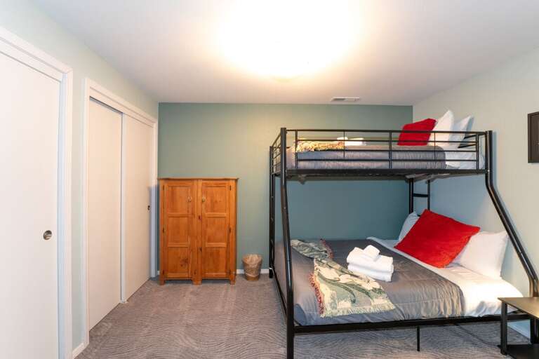 Twin-over-Queen bunkbed and twin-size bed | Lower Level Twin-over-Queen bunkbed and twin-size bed | Lower Level