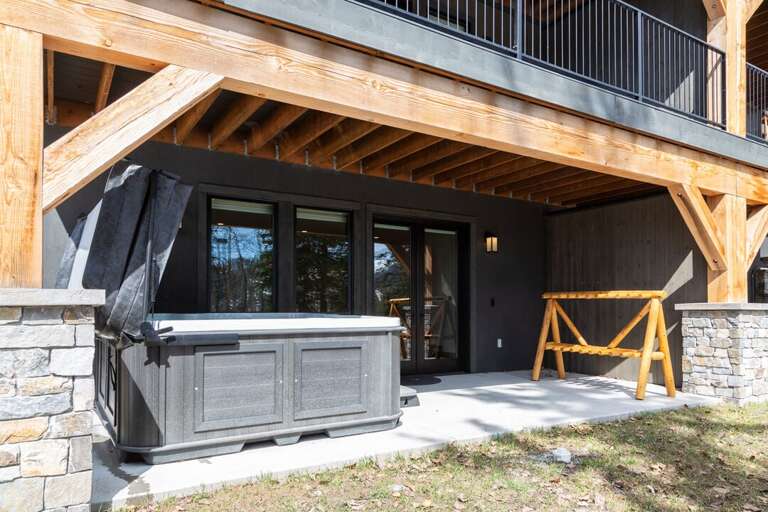 Lower Level Patio with Private Hot Tub and offers ski in/ski out | Exterior