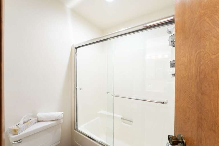 Enjoy a Warm Bath after a Day of Skiing in this Glass enclosed Shower/Tub | Lower Level Enjoy a Warm Bath after a Day of Skiing in this Glass enclosed Shower/Tub | Lower Level