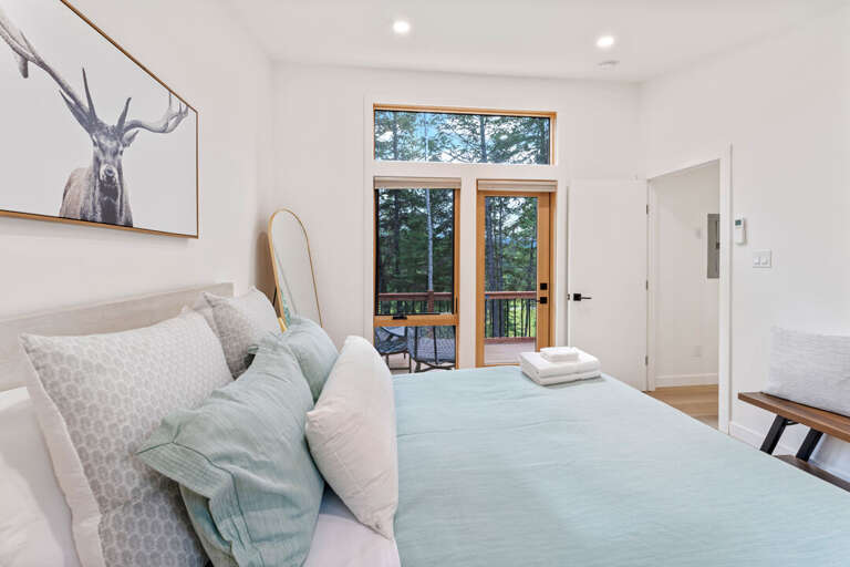 Bedroom 1 with deck access | Main Level Bedroom 1 with deck access | Main Level