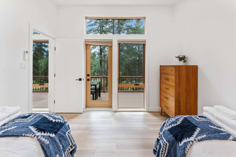 Bedroom 2 with deck access | Main Level Bedroom 2 with deck access | Main Level