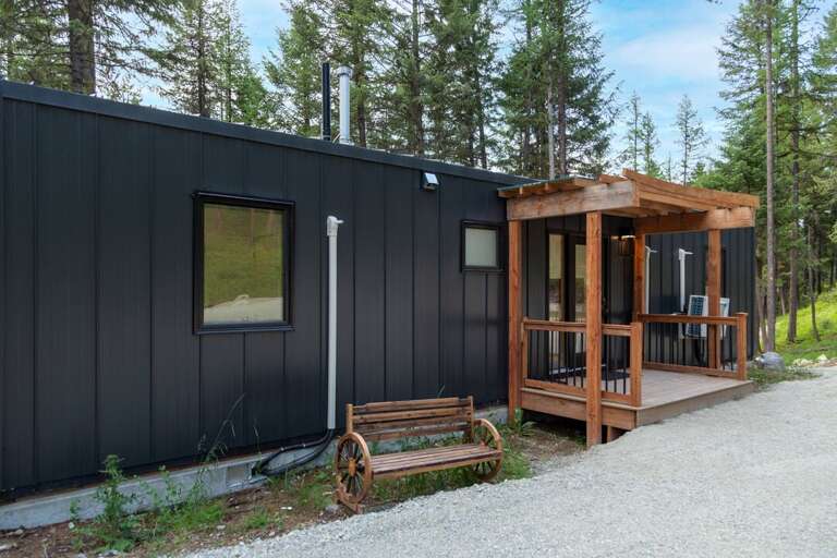 Front exterior | with a bench Front exterior | with a bench