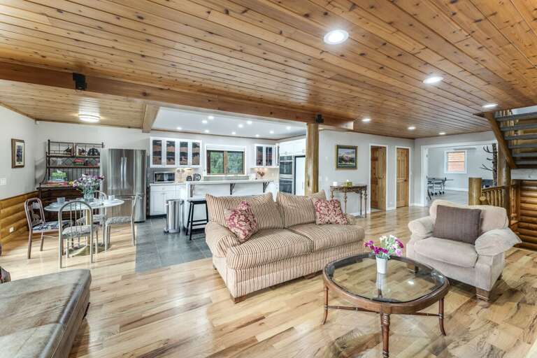 Living Room with Cozy Furnishings | Main Level Living Room with Cozy Furnishings | Main Level