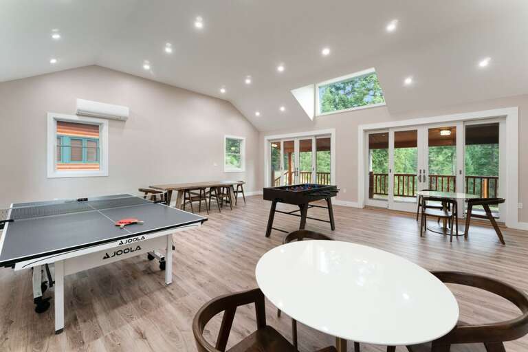 Main Level Game Room with Ping Pong and Foosball | Main Level Main Level Game Room with Ping Pong and Foosball | Main Level