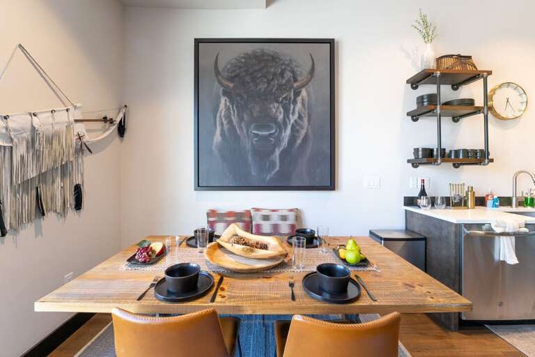 Dining room table seating for four people | Main Level