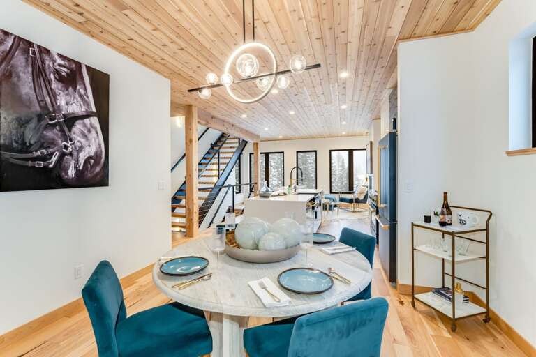 Dining room table seating for four people | Upper Level