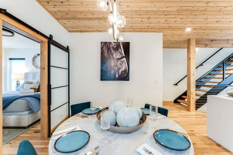 Dining room table seating for four people | Upper Level