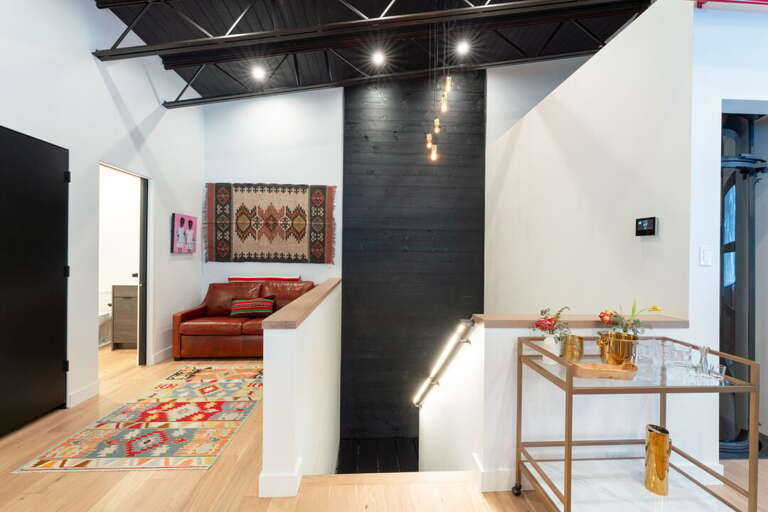 Full Shared Bathroom with Shower on Upper Level and Stairs to Main Level Bedrooms | Upper Level