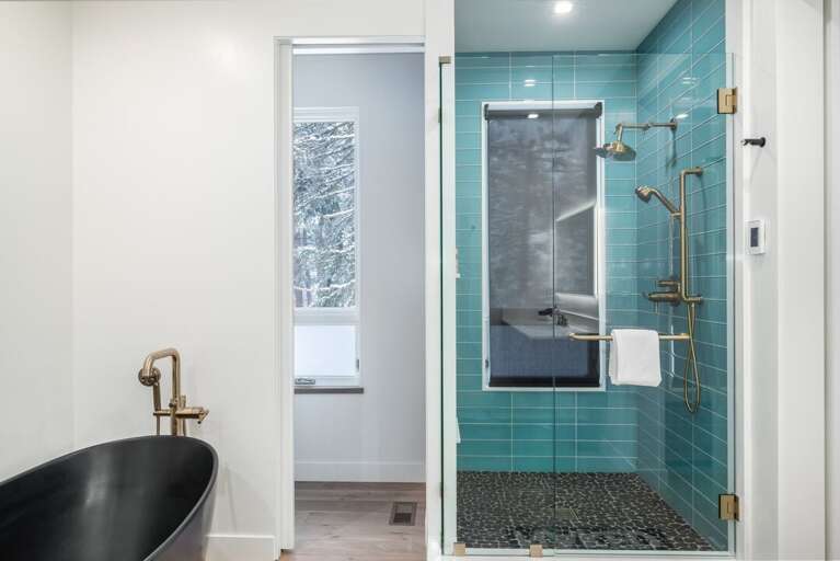 Master En Suite Bathroom with Modern Soaking Tub and Beautifully Subway Tiled Shower | Middle Level