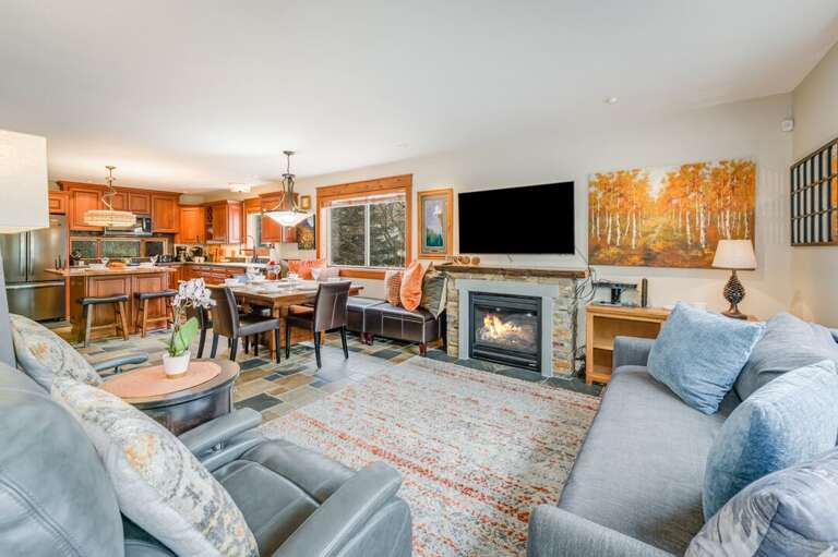 Spacious Living Room with Cozy Furnishings and Smart TV | Main Level