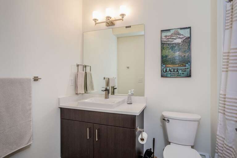 The main level bathroom is perfect for guests | Main Level