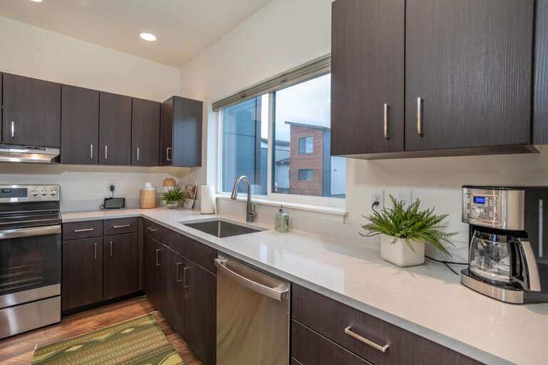 The kitchen has lots of natural light while you're cooking | Main Level