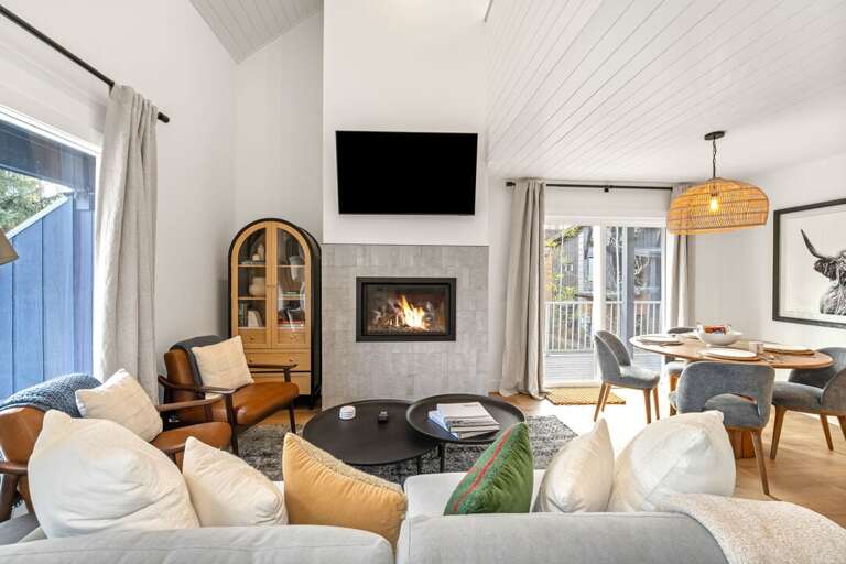 Cozy up by the fireplace and have family movie night | Main Level Cozy up by the fireplace and have family movie night | Main Level