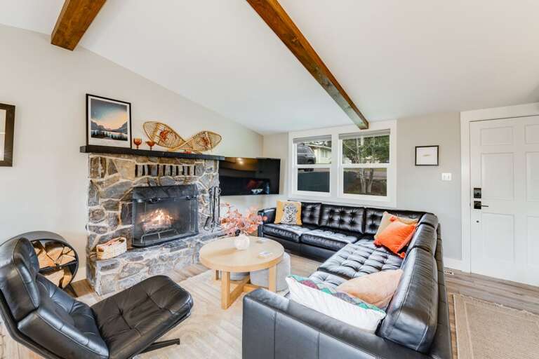 Unwind on the comfortable oversized leather sectional | Main Level