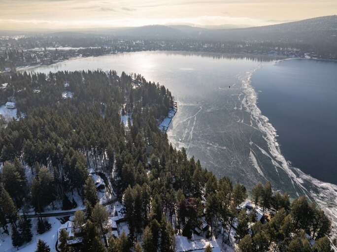 Aerial Views of Partially Frozen Whitefish Lake | Exterior