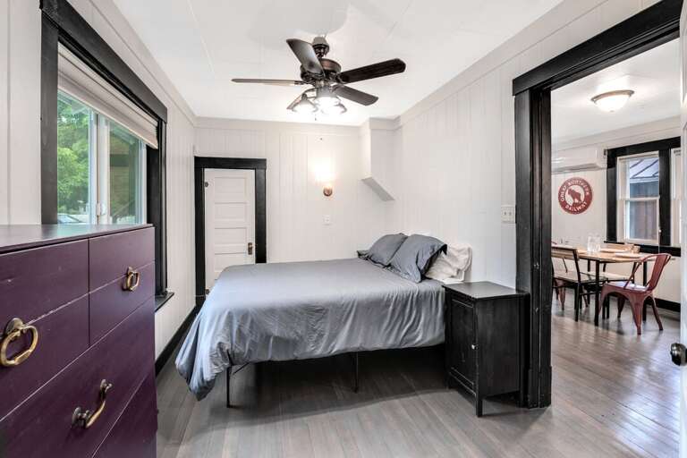 Bedroom 1 with Queen Bed and Access to Shared bathroom | Main Level